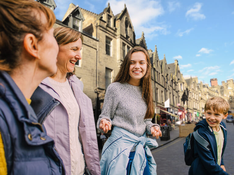 A family walking through the streets of Edinburgh